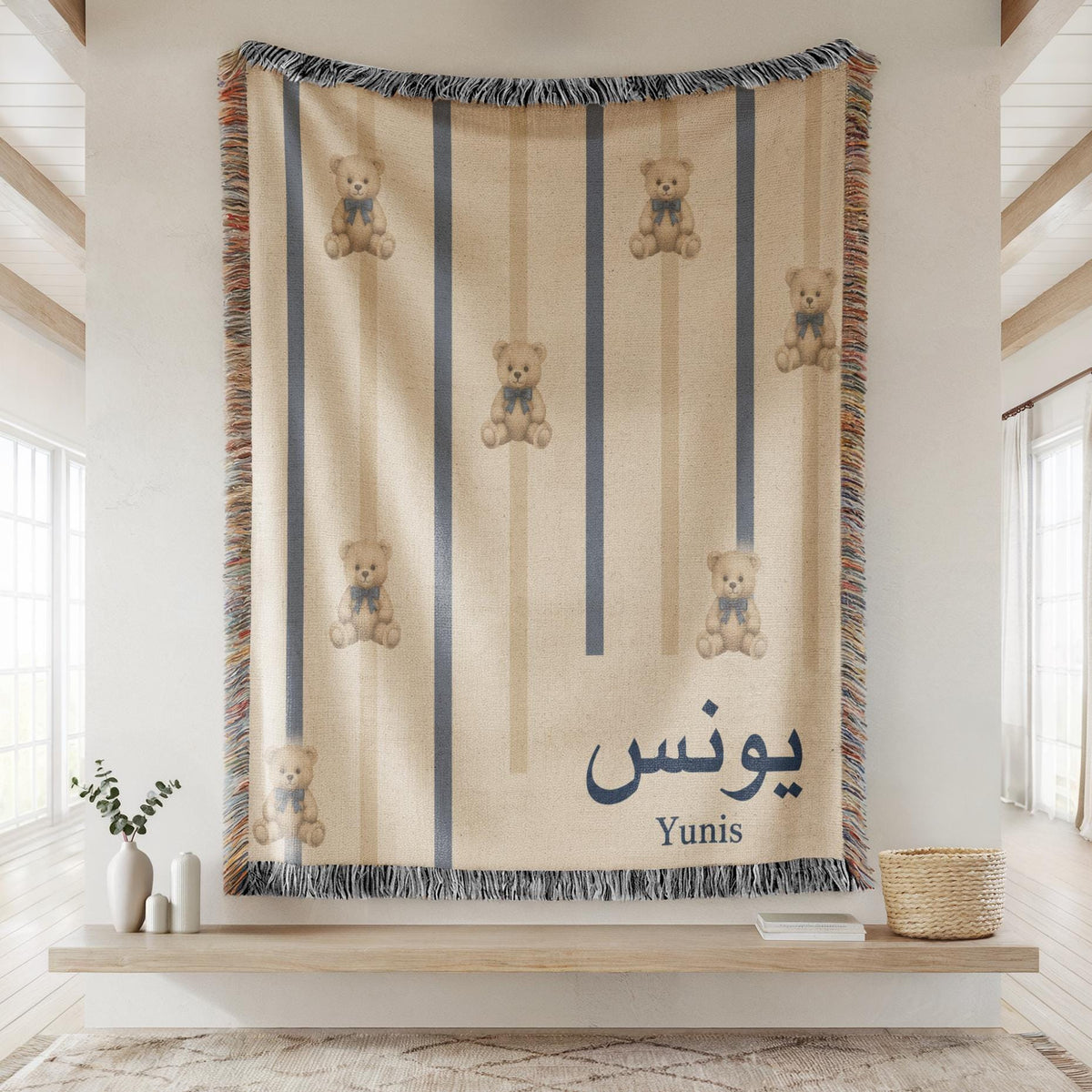 Distant view of the Personalized Teddy Bear Navy Ribbon Arabic Boy blanket, displayed flat on a wall, highlighting the entire teddy bear and ribbon pattern.